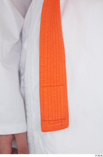 Selin dressed jiu-jitsu kimono orange belt sports upper body 0010.jpg